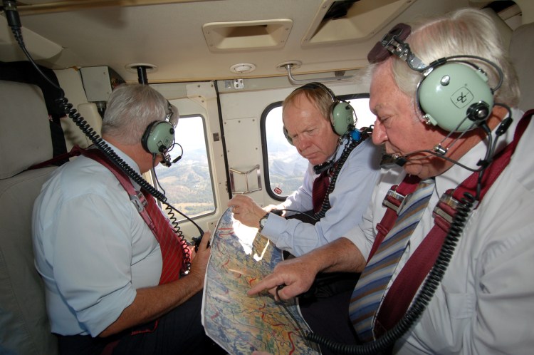 Former Premier Peter Beattie (State MP 1998-2007), Mr Mick Venardos (Mayor of Cooloola/Gympie 1997-2008), Mr Henry Palaszczuk (Minister for Natural Resources, Mines and Water - Feb 2006-Sept 2006) looking over the dam site - Traveston Dam protest - April 2006 - Gympie Times collection