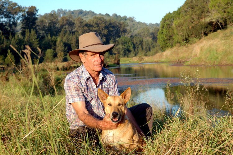 Alan Holznagel with dog near the proposed new dam site - Traveston Dam protest - April 2006 - Gympie Times collection